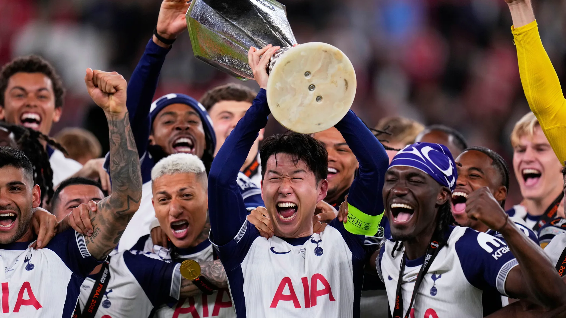 Tottenham players celebrate after winning the Europa League final soccer match against Manchester United at the San Mames Stadium in Bilbao, Spain, Wednesday, May 21, 2025. (AP Photo/Manu Fernandez)